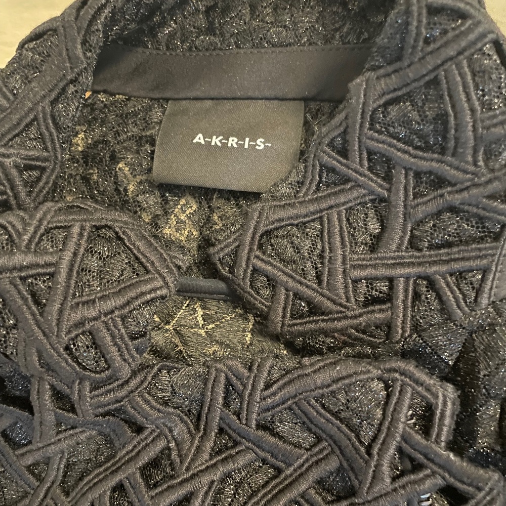 Evening lace jacket with zippers. Akris. Black.